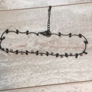 Choker necklace with pink rhinestones